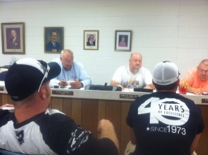 Pair, left, and Powell, listen as, from left, Moore, Tony Hux Sr. and Gary Hooker discuss plans.