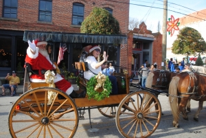 Santa is carried down King Street during last year&#039;s parade.