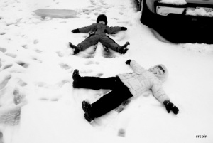 Payton and Holden Ford make snow angels today.