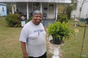 Robinson stands in front of her house on Vance Street.