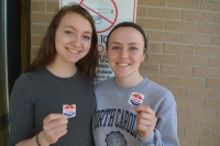 Fromal, left, and Scardino show their early voting stickers.