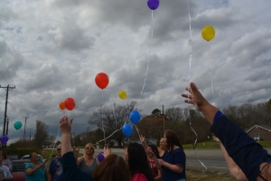 Balloons are released in honor of the missing.