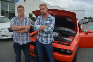 Dykstra, left, and Scheeringa pose in front of the Hellcat.