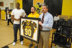 Martin, left, with coach Brandon Clay, center, and White.
