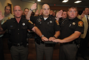 Aycock, far right, in this file photo being sworn in last August.