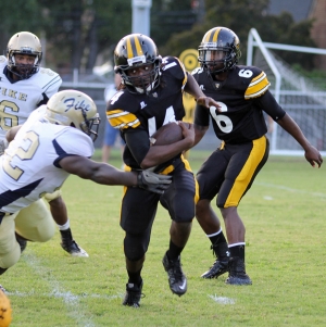 Brooks tries to elude the Fike defense.