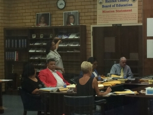 A scene from a Halifax County board of education meeting.