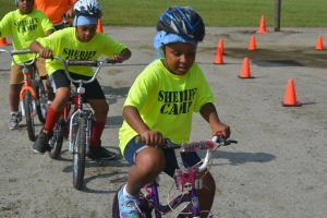 Children participate in the bike rodeo.