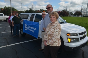 From left, Winnie Wiseman, new external affairs manager, Hall, Aycock, Doughtie, Tripp and Pekrun pose in front of the truck.