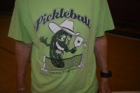 A demonstrator wearing a pickleball shirt.